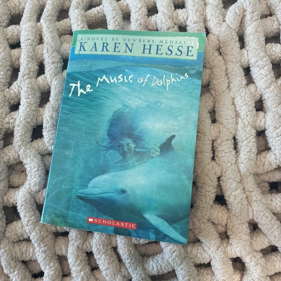 The music of dolphins by Karen Hesse | Book - Picture 1 of 5